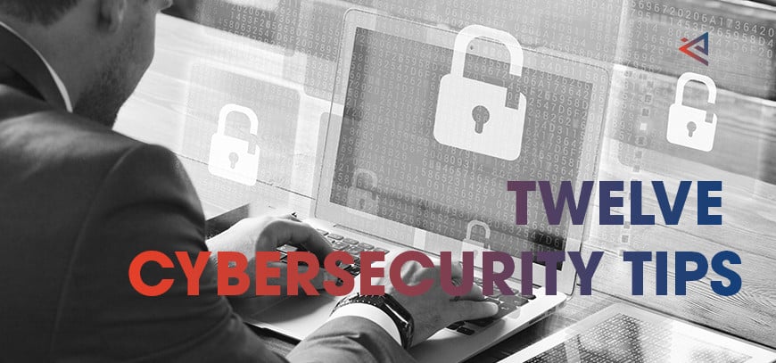 Man typing on laptop using cybersecurity tips