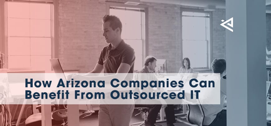 Employees working on computers in office