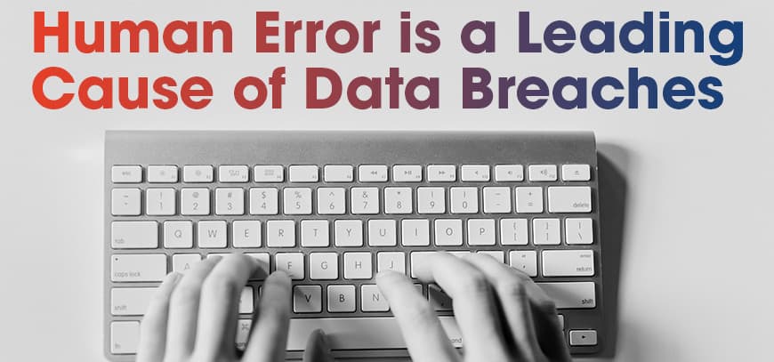 Hands typing on keyboard for cybersecurity awareness month