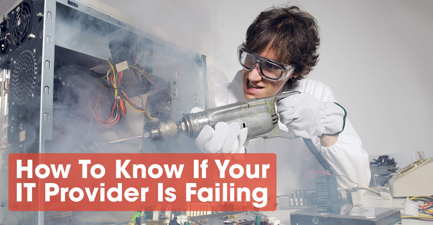 man in a lab coat using a drill on a computer tower