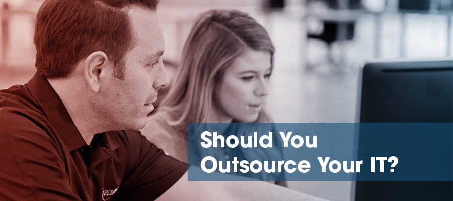 IT technician helping woman