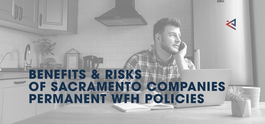 Employee working from home on laptop in kitchen