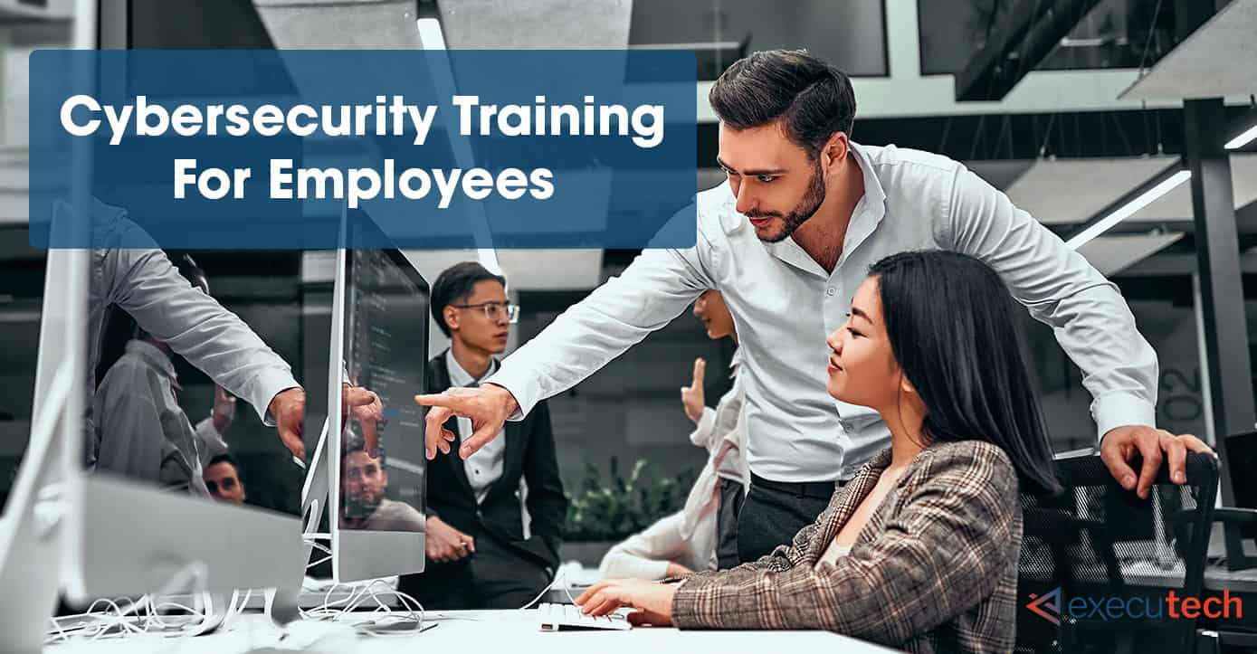 male employee providing cybersecurity training to a female coworker in a shared workspace